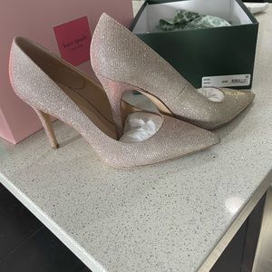 Shiny pink high heel shoes